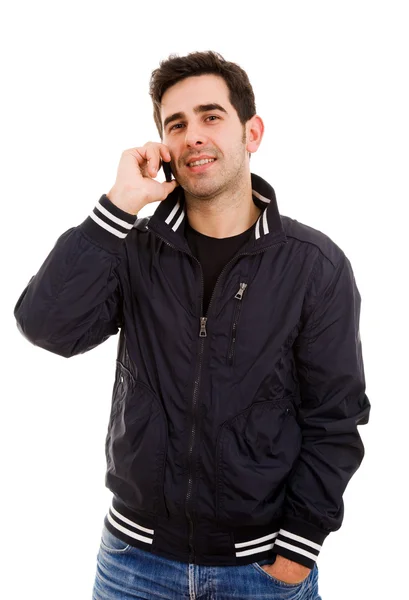 Joven guapo hablando por teléfono, aislado en blanco — Foto de Stock