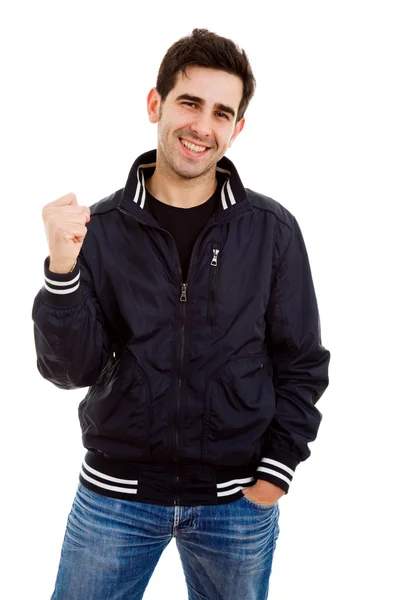 Porträtt av en upphetsad ung man med händerna upp i seger ag — Stockfoto