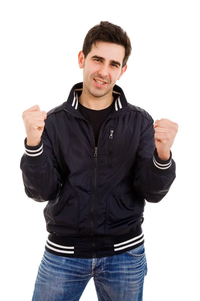 Porträtt av en upphetsad ung man med händerna upp i seger ag — Stockfoto