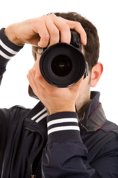 Μεγέθυνση του ένας νεαρός φωτογράφος με φωτογραφική μηχανή, που απομονώνονται σε λευκό — Φωτογραφία Αρχείου