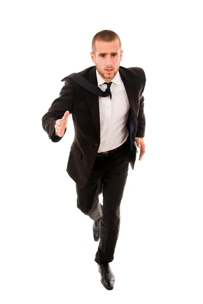 Jovem homem de negócios correndo isolado no fundo branco — Fotografia de Stock