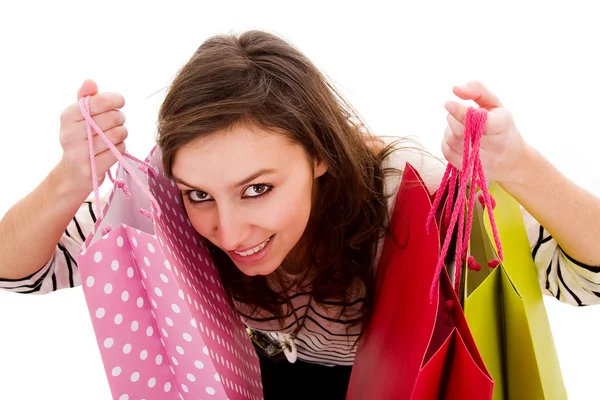 Krásná šťastná mladá žena drží nákupní tašky. — Stock fotografie