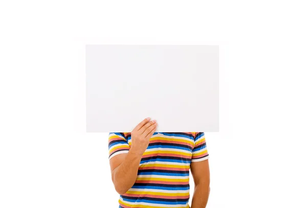 Giovane maschio in possesso di carta bianca vuota — Foto Stock