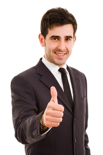 Улыбающийся молодой бизнесмен поднимает большой палец — стоковое фото
