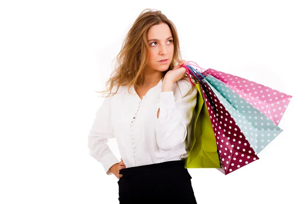 Bela jovem mulher com sacos de compras — Fotografia de Stock