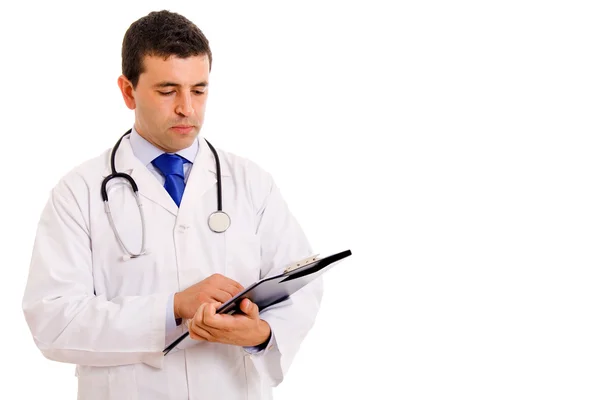 Young doctor looking at the notebook — Stock Photo, Image