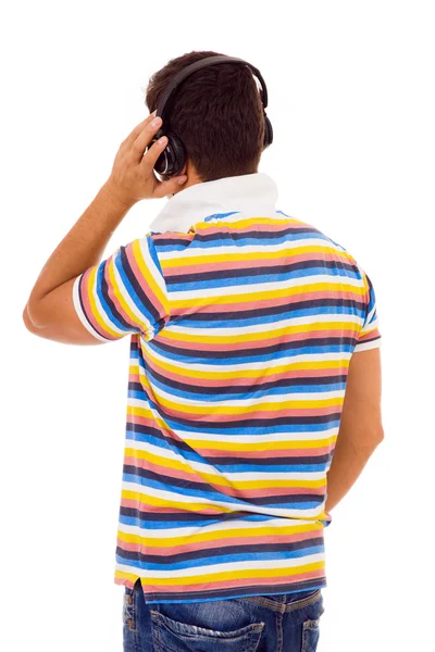 Jonge man die muziek luistert — Stockfoto