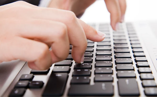 Secretary’s hand touching computer keys during work — Stock Photo, Image
