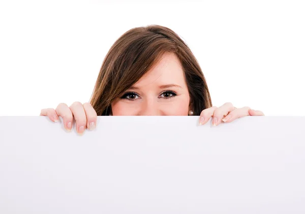 Young woman holding blank billboard — Stock Photo, Image