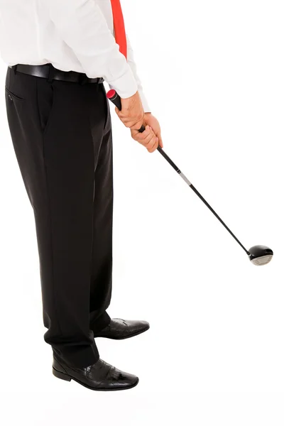 stock image Business man playing with a golf club