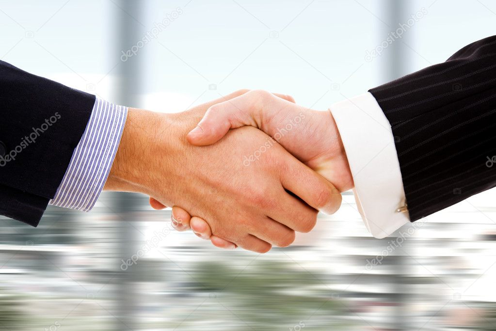 Business handshake at the office