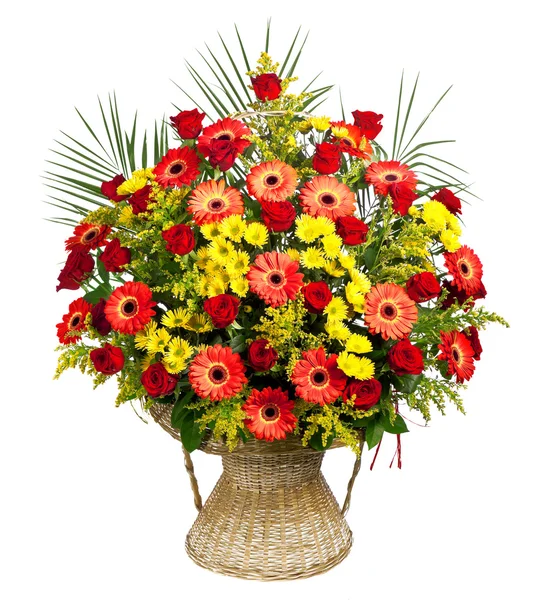 stock image Basket of roses, gerberas and palm leaves