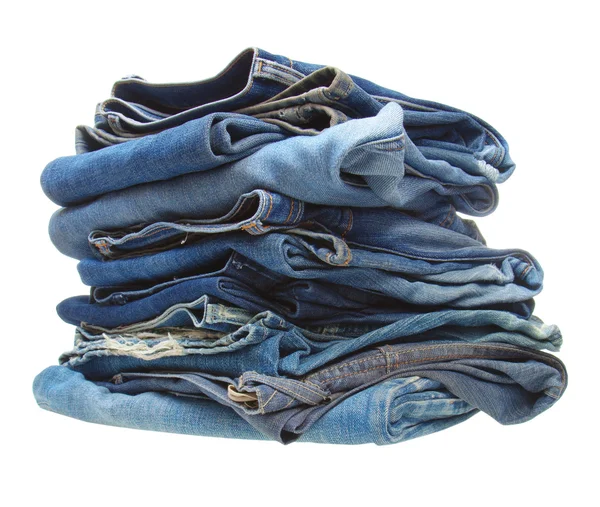 Pila de ropa de mezclilla azul — Foto de Stock