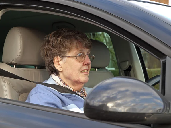 Mujer mayor conduciendo Fotos de stock