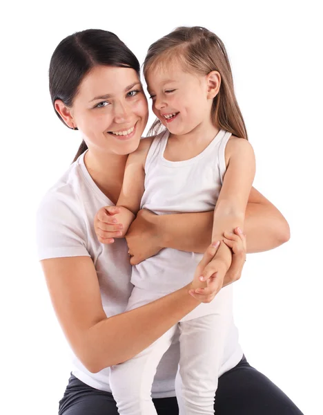 Young beautiful mom holding small daughter. Isolated — Stock Photo, Image