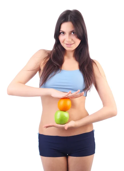 Młoda kobieta trzymać jabłko i pomarańcza. na białym tle — Zdjęcie stockowe
