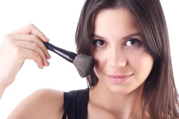 Beautiful woman with a make-up brush. Isolated — Stock Photo, Image