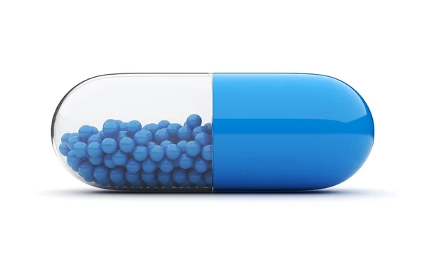 Блакитна медична таблетка 3D. Вітаміни. Ізольовані на білому тлі Стокове Фото
