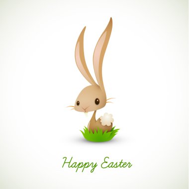 Easter Bunny Sitting in Grass clipart