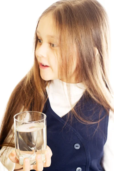Girl holding a glass of water — Stock Photo, Image
