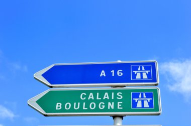 French Road Sign Pointing to Calais and Boulogne (Channel Ports) clipart