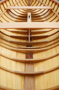 Beautiful wooden boat under construction clipart