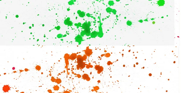 Oranje en groen splatter — Stockfoto