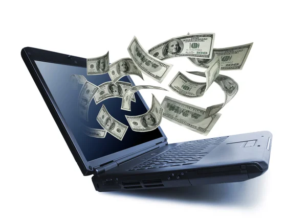 Dinheiro que sai de um computador portátil — Fotografia de Stock