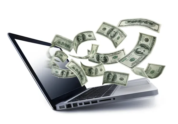 Money pouring out from a notebook computer — Stock Photo, Image