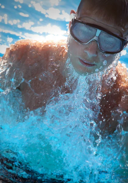 Detail of young man swimming — Stock Photo, Image