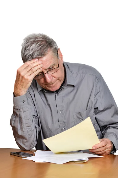 Senior man with papers — Stock Photo, Image
