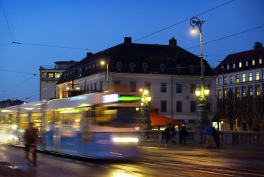 Gothenburg at night. Some trams and in motion clipart