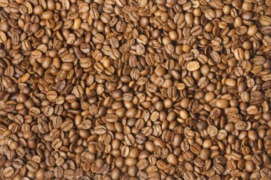 Coloured coffee texture. Coffee beans closeup clipart