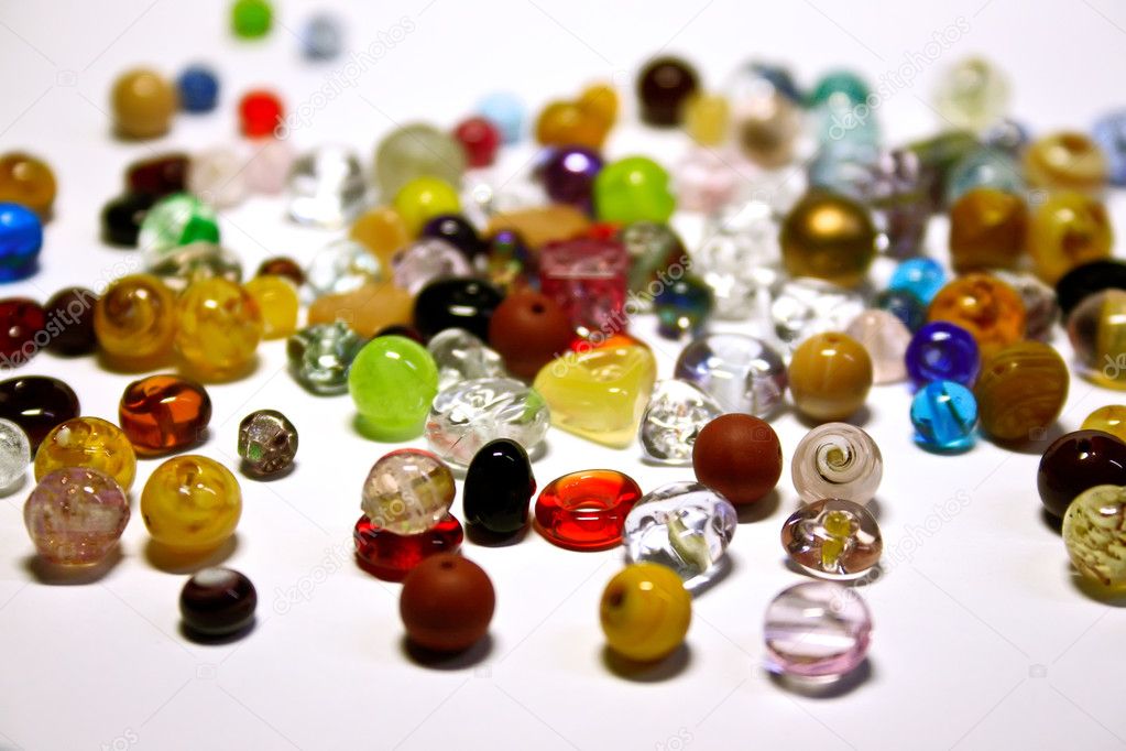 Multicolored jewel stones over white background