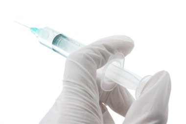 The syringe in a hand clipart