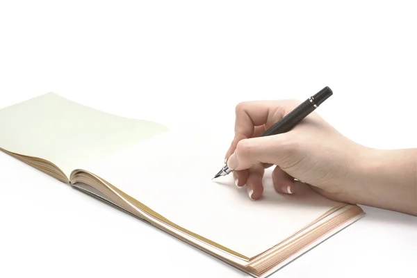 Escribir hend en un cuaderno — Foto de Stock