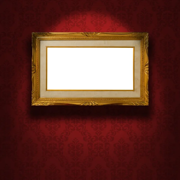 Leerer goldener Rahmen an der Wand. — Stockfoto