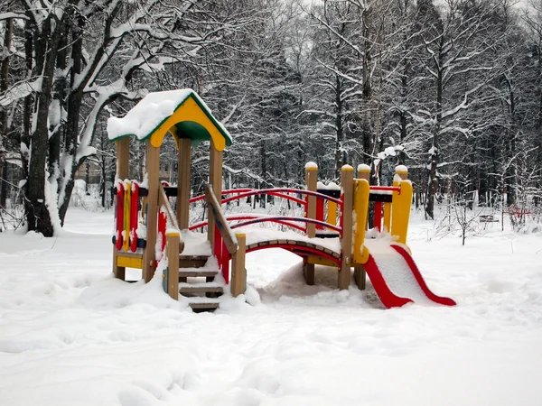 stock image Children's playground in winter