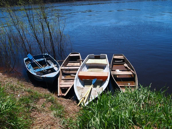 stock image Boats on a shore of a river