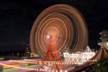 Ferris wheel in Luna Park Sydney, Australia clipart