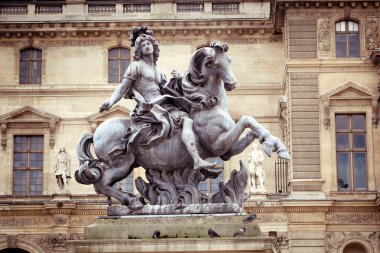 Equestrian statue of king Louis XIV at Louvre Museum, Paris, Fra clipart