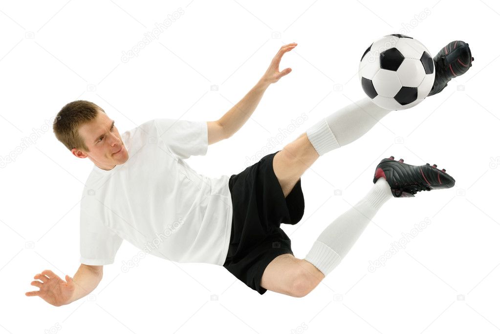 Skilled soccer player in midair