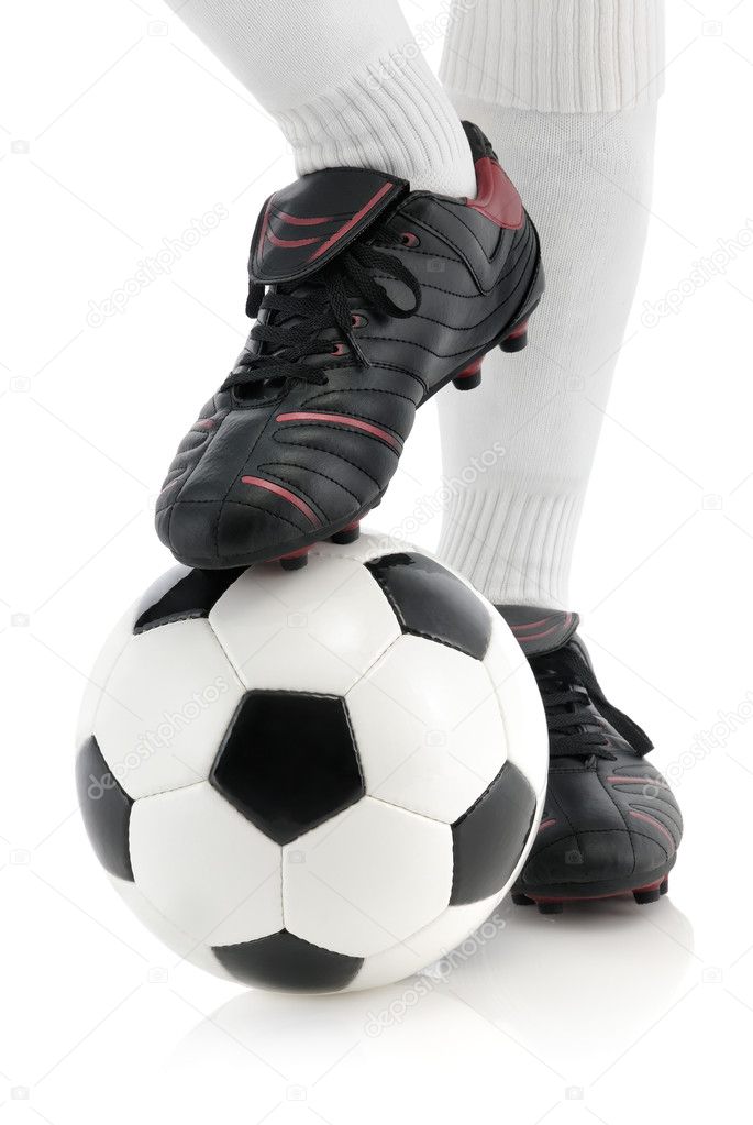 Football player's foot on the ball