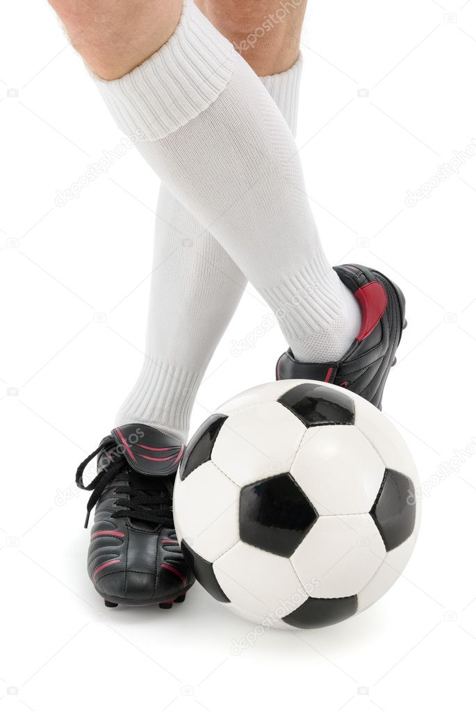 Football player's feet with the ball