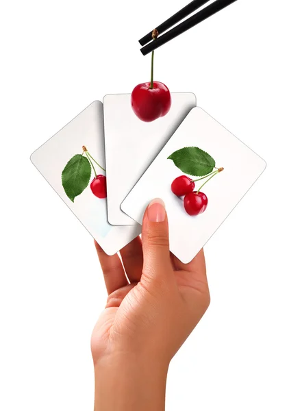 Cards and cherries — Stock Photo, Image