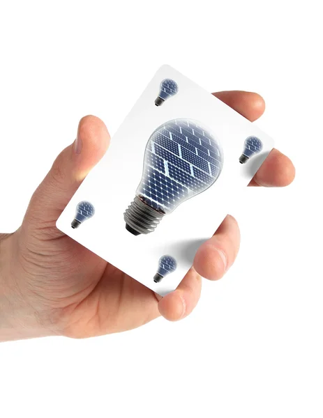 Card hand with light bulb solar panel — Stock Photo, Image