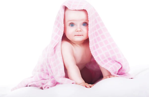 Cute baby siting under towel — Stock Photo, Image