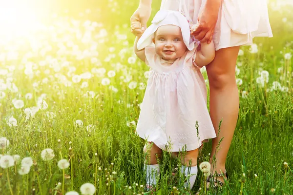 stock image Happy child with mother on the field