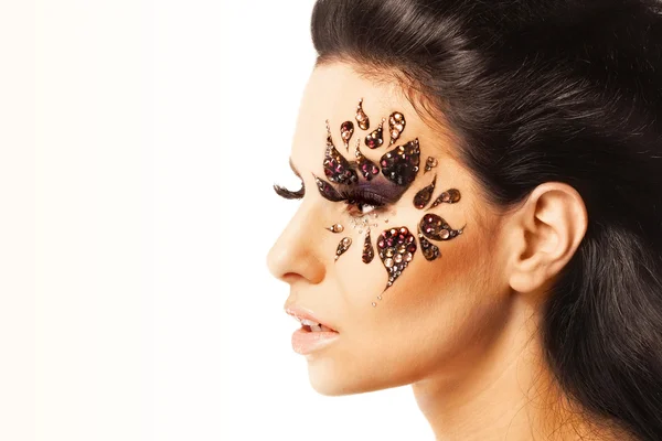 Woman with black hair and art make up — Stock Photo, Image