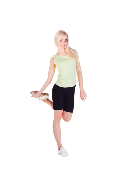 Meisje je haar oefening op één been doet en glimlachen — Stockfoto